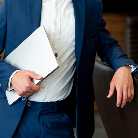 An image featuring a professional in a stylish blue suit, highlighting the influence of blue color psychology in conveying trust, confidence, and professionalism.