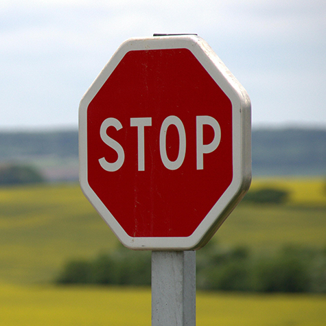 A vivid image of a classic red stop sign, symbolizing the essence of color psychology with a focus on the emotional impact of the color red.