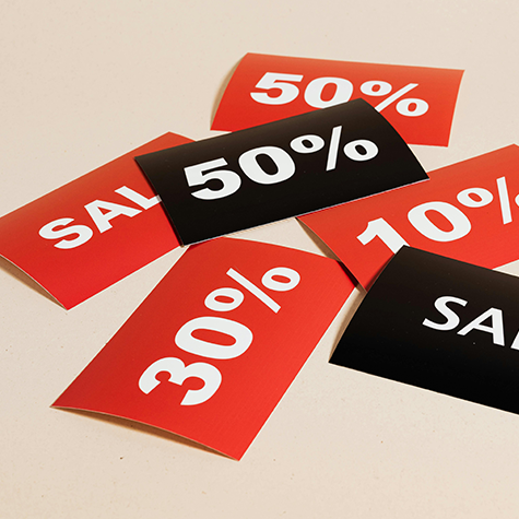 An image showcasing vibrant red sale cards, offering a glimpse into the world of color psychology, with a focus on the compelling impact of the color red in the context of sales and promotions.